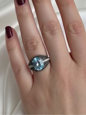 Sterling Silver Glacier Blue Topaz Halo Statement Ring